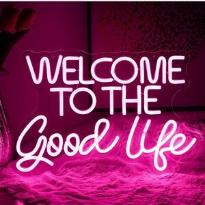 Pink Neon Sign 'Welcome to the Good Life'